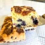 A square of gluten-free blueberry lemon coffee cake.