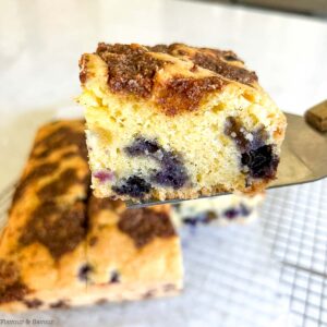 A square of gluten-free blueberry lemon coffee cake.