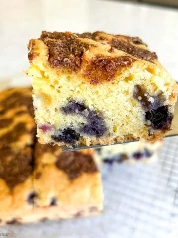 A square of gluten-free blueberry lemon coffee cake.