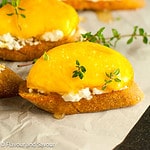 Peach crostini with lemon ricotta cheese and honey.
