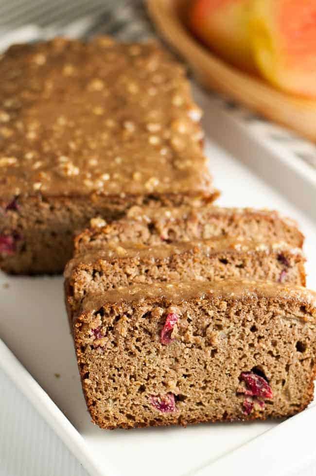 Apple Cranberry Bread on a white rectangular serving dish