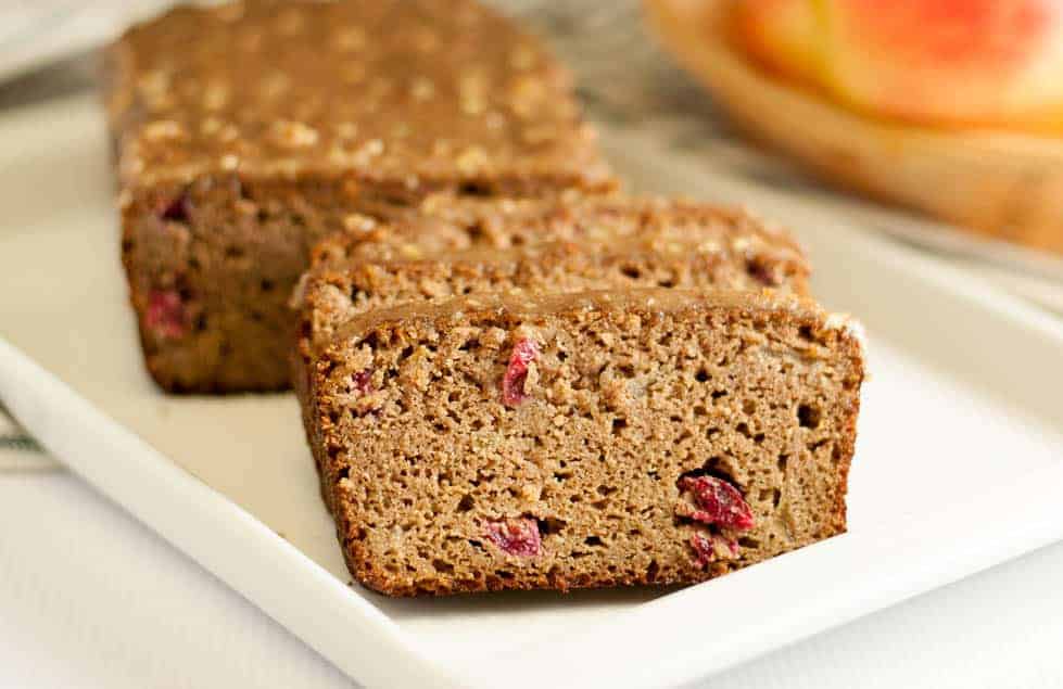 a loaf of Apple Cranberry Bread sliced