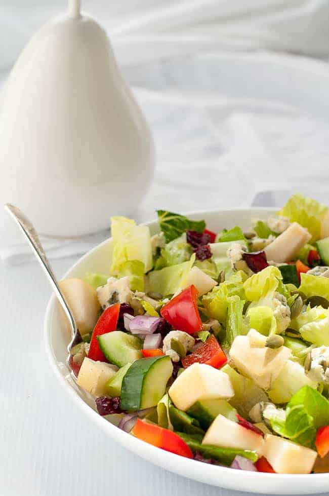 Pear and Cranberry Chopped Salad. Crisp pears and crunchy vegetables with sweet cranberries and tangy blue cheese make this colourful fall salad. A family favourite, perfect for potlucks. |www.flavourandsavour.com