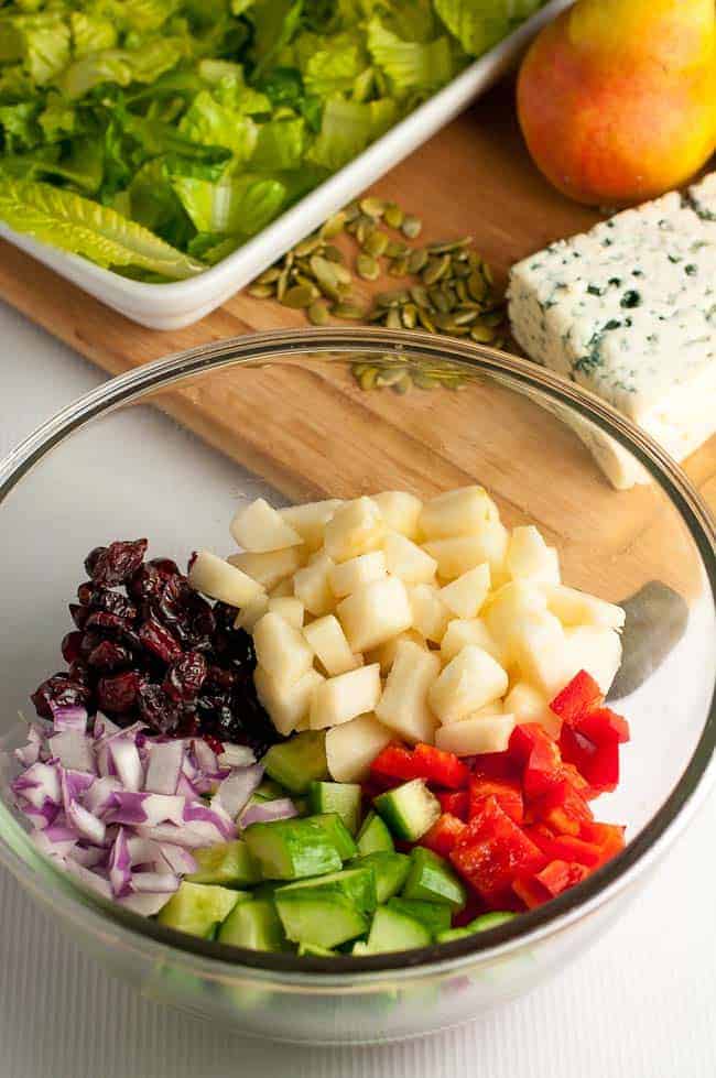 Asian Pear and Cranberry Chopped Salad. Crisp pears and crunchy vegetables with sweet cranberries and tangy blue cheese make this colourful fall salad. A family favourite, perfect for potlucks. |www.flavourandsavour.com