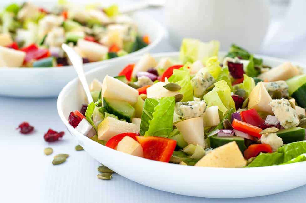 Pear and Cranberry Chopped Salad. Crisp pears and crunchy vegetables with sweet cranberries and tangy blue cheese make this colourful fall salad. A family favourite, perfect for potlucks. One of 6 Tasty Healthy Winter Salads. |www.flavourandsavour.com