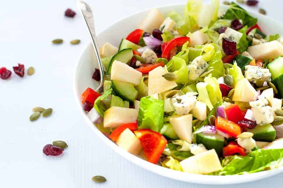 Pear and Cranberry Chopped Salad. Crisp pears and crunchy vegetables with sweet cranberries and tangy blue cheese make this colourful fall salad. A family favourite, perfect for potlucks. |www.flavourandsavour.com
