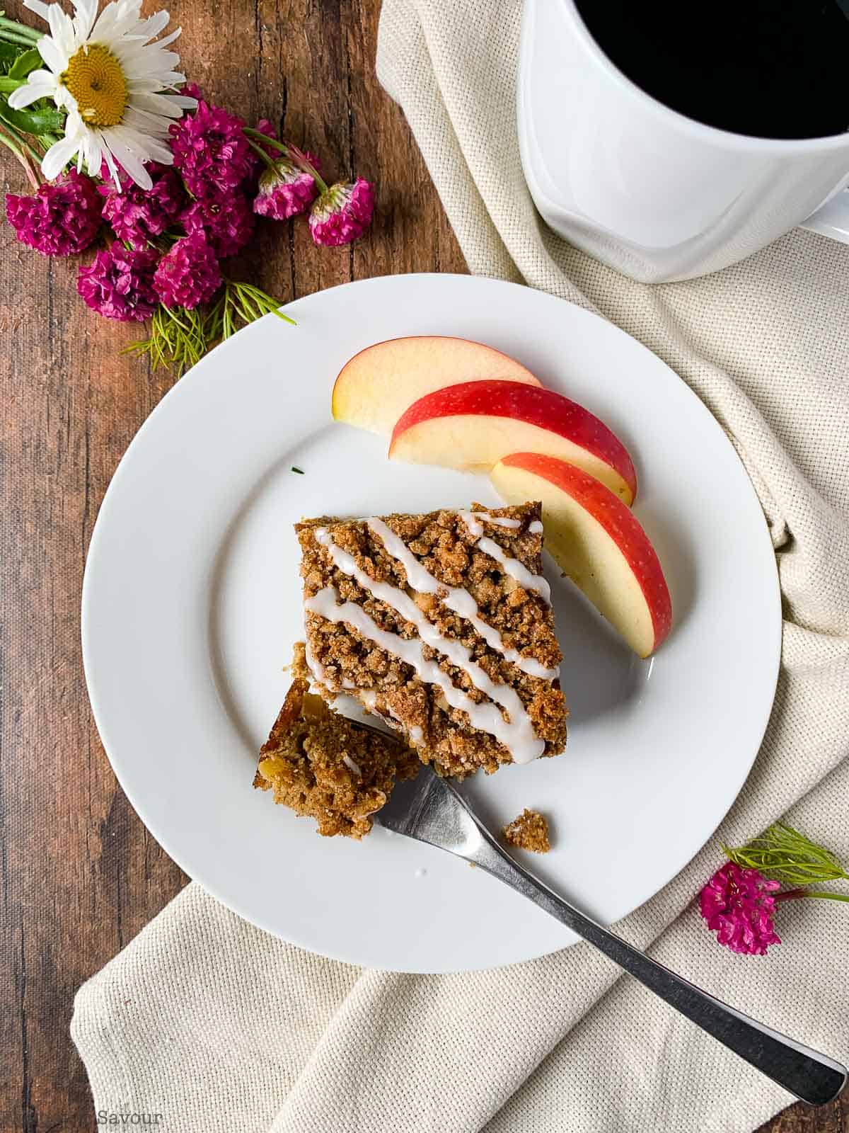 A forkful of gluten-free apple coffee cake.