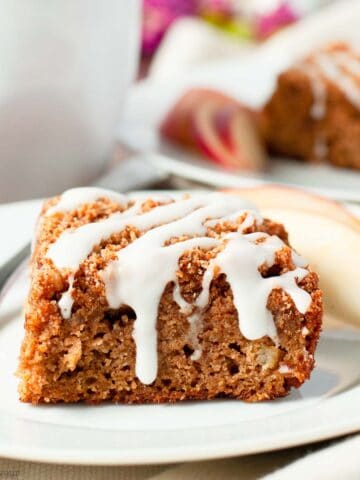 a square of apple cinnamon coffee cake with maple walnut streusel