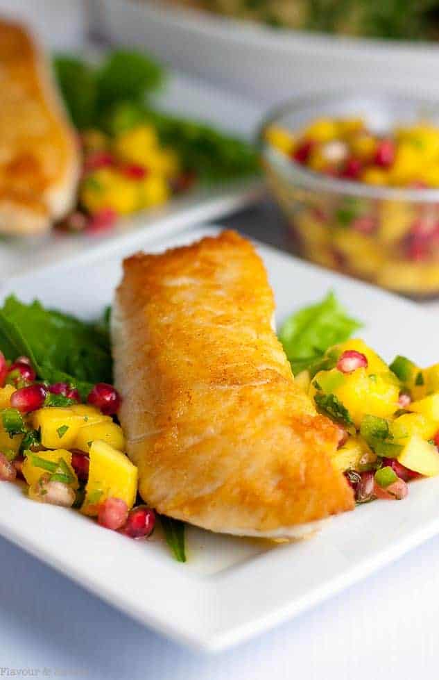 This salt and pepper Crusted Halibut with Mango Pomegranate Salsa is an easy weeknight meal that’s spectacular enough for entertaining. Ready in 15 minutes! |wwwflavourandsavour.com