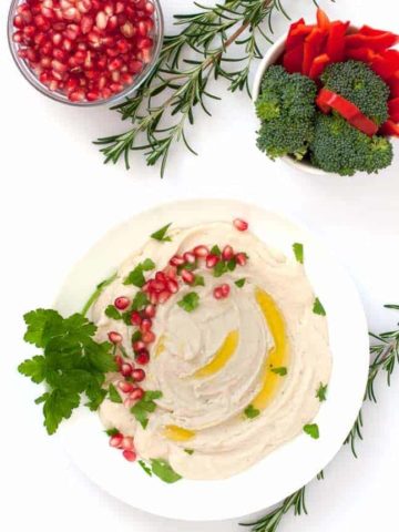 Creamy Lemon Feta Dip garnished with pomegranates.