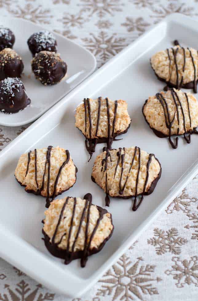 These gluten-free Chocolate Dipped Crispy Coconut Cookies are coated and drizzled with a thin layer of dark chocolate. Make ahead and freeze for unexpected company. |www.flavourandsavour.com