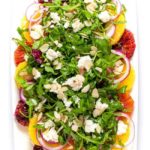 Citrus Salad with Arugula and Goat Cheese. Fresh sweet oranges, fresh mint and spicy arugula topped with tangy cheese and flaked almonds make a beautiful winter salad. |www.flavourandsavour.com