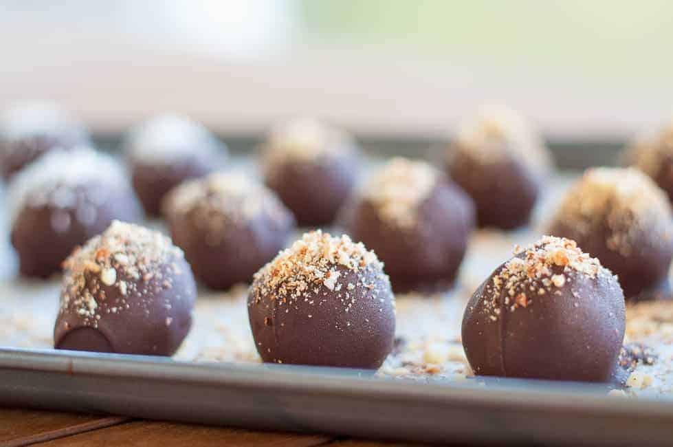 These no-bake Roasted Almond Chocolate Truffles have all the flavour and decadence of a traditional truffle, but they're suitable for your friends and family following paleo, vegan or gluten-free diets.