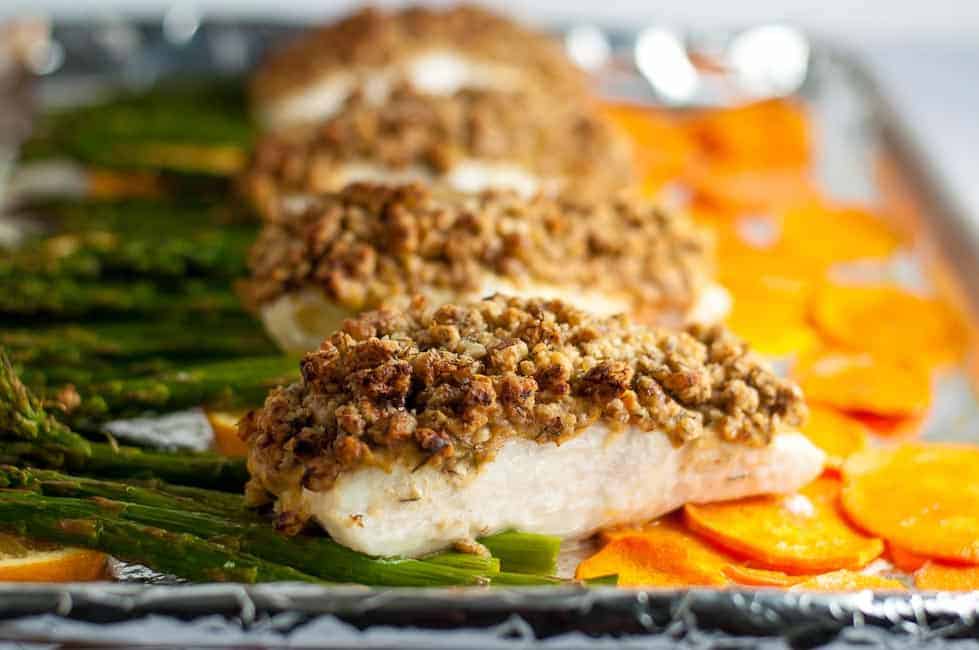 Maple Walnut Crusted Sheet Pan Halibut with crispy sweet potato chips and asparagus. A one-pan paleo meal that cooks in only 10 minutes. |www.flavourandsavour.com