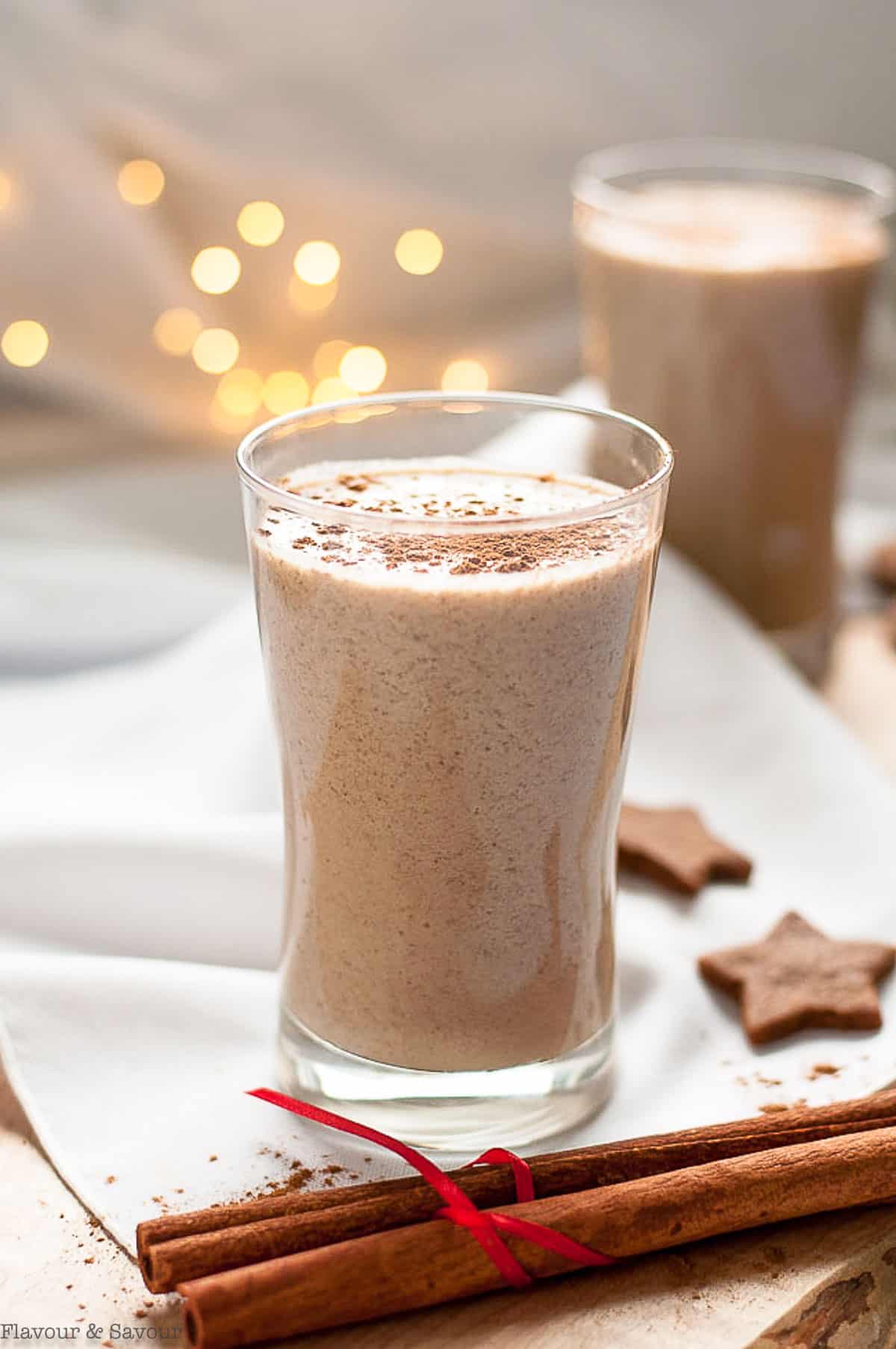 two glasses of chia gingerbread smoothie with cinnamon sticks