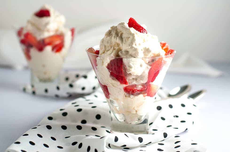 Traditional Strawberry Eton Mess in two dessert glasses