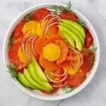 Overhead View of Grapefruit-Orange Avocado Salad with Ginger-Orange Dressing