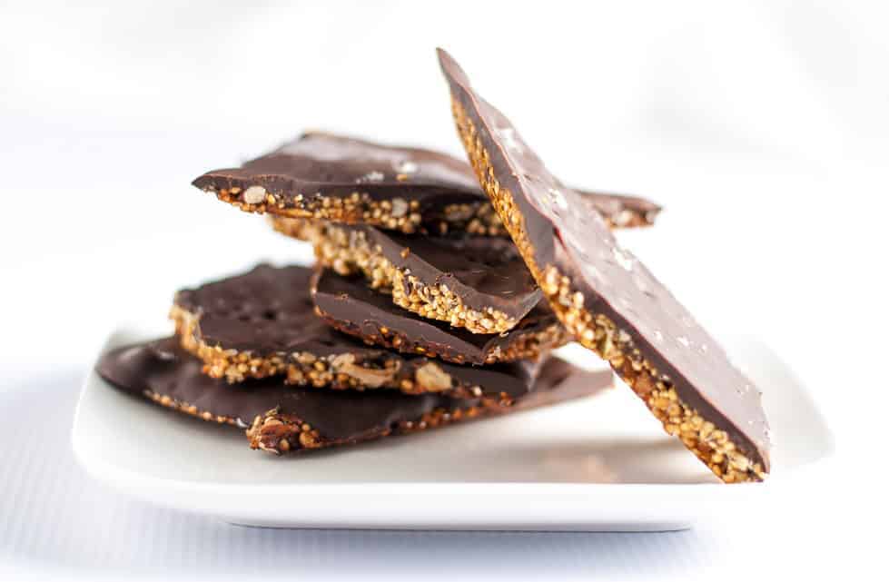 Healthy Quinoa Chocolate Bark stacked on a plate