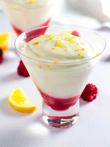 This delicately sweet and airy Light Lemon Mousse is made without raw eggs. Made with Greek yogurt, it's flavoured with fresh lemon juice and blueberry or raspberry sauce.