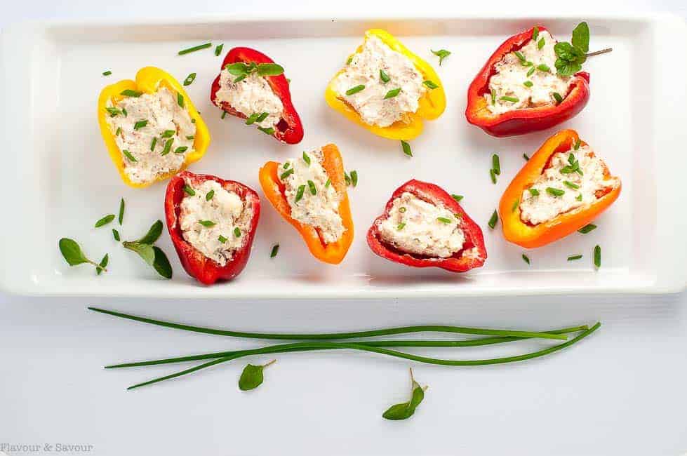 appetizer of Sun-dried Tomato, Artichoke and Cheese Stuffed Mini Peppers.