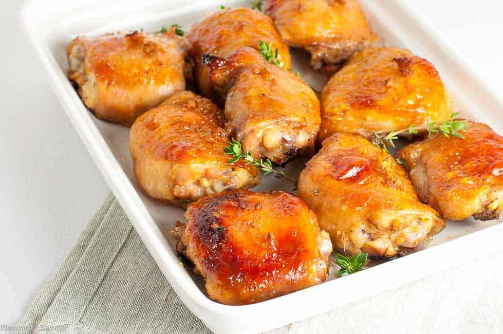 Maple Garlic Glazed Chicken in a white serving dish