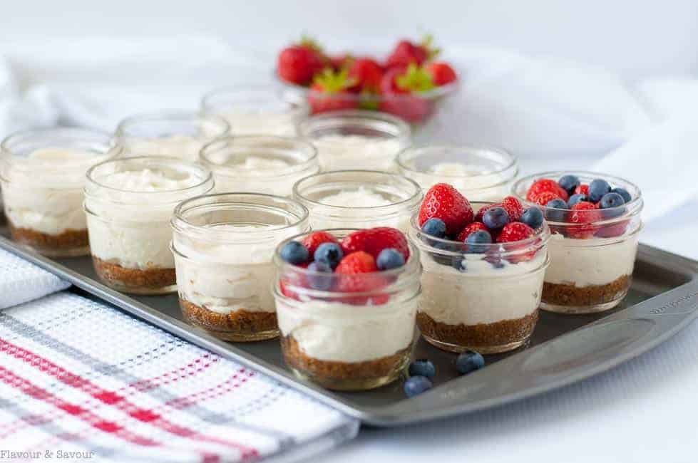 Mini no-bake cheesecakes made and served in Mason jars make an ideal dessert for a picnic, for camping, or as a fun treat for kids. A quick and easy dessert.