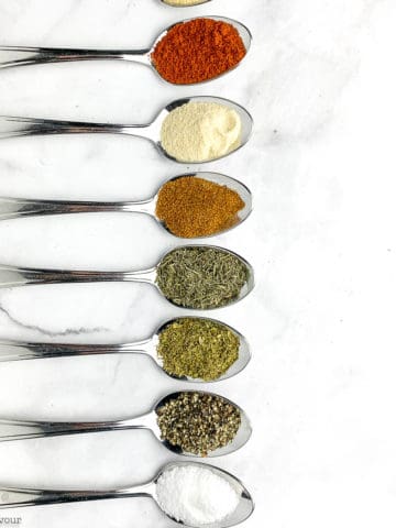 spoons with spices for Cajun seasoning mix