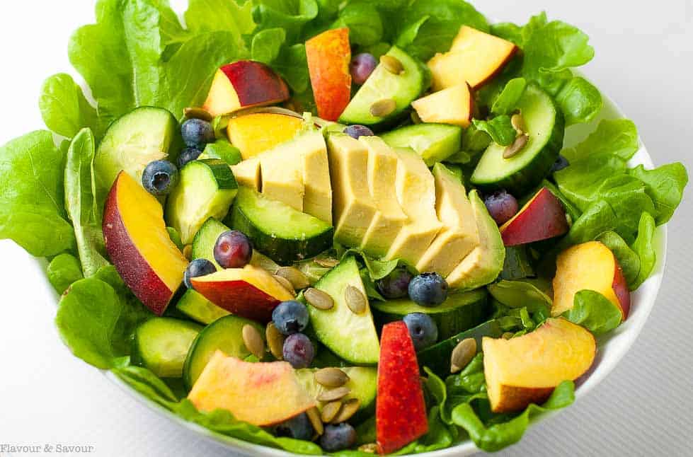 Sweet stone fruit, creamy avocados, and crisp cucumbers drizzled with a smoky dressing make this Nectarine Avocado Salad a superb addition to a summertime meal. |www.flavourandsavour.com