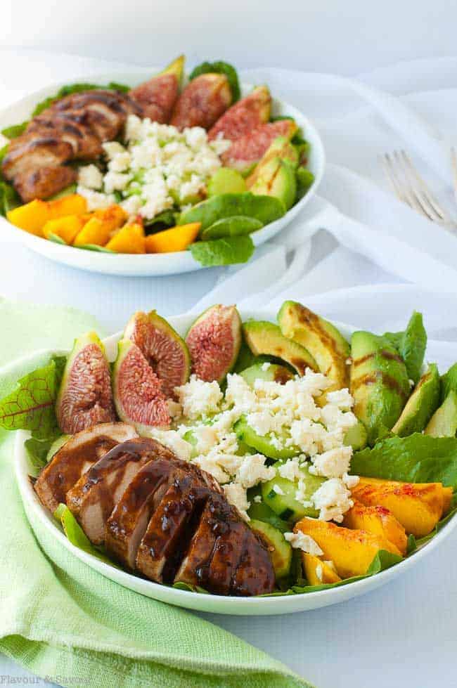 This Balsamic Glazed Chicken Salad combines succulent chicken breasts with garden greens, feta cheese, fresh figs, peaches and avocado. Summer in a bowl!