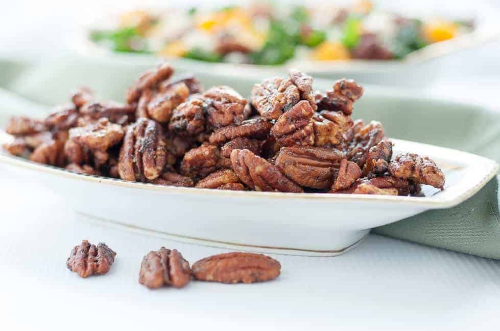 20-minute Caramel Spiced Pecans displayed as a salad topper or a finger food