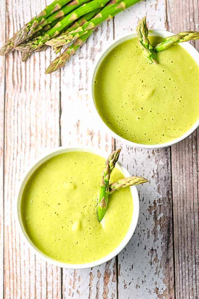 This Dairy-Free Creamy Asparagus Soup is rich and creamy–but made without cream! A comforting homemade dairy-free soup recipe.