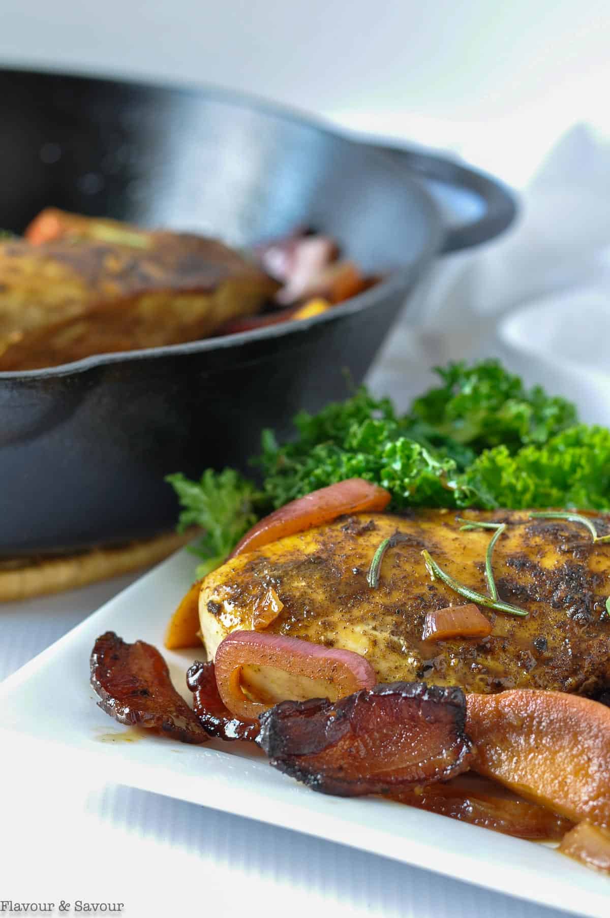 One Pan Spiced Apple Chicken with Bacon in a cast iron skillet