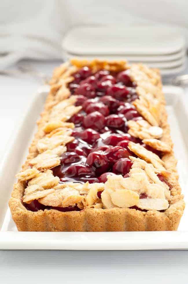 This Sour Cherry Almond Tart is gluten-free, it's just sweet enough, and it's an easy dessert to make for your next party!|www.flavourandsavour.com