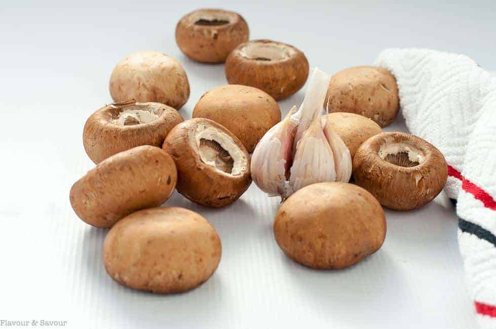 Preparing mushrooms for Garlic Lovers' Blue Cheese Stuffed Mushrooms