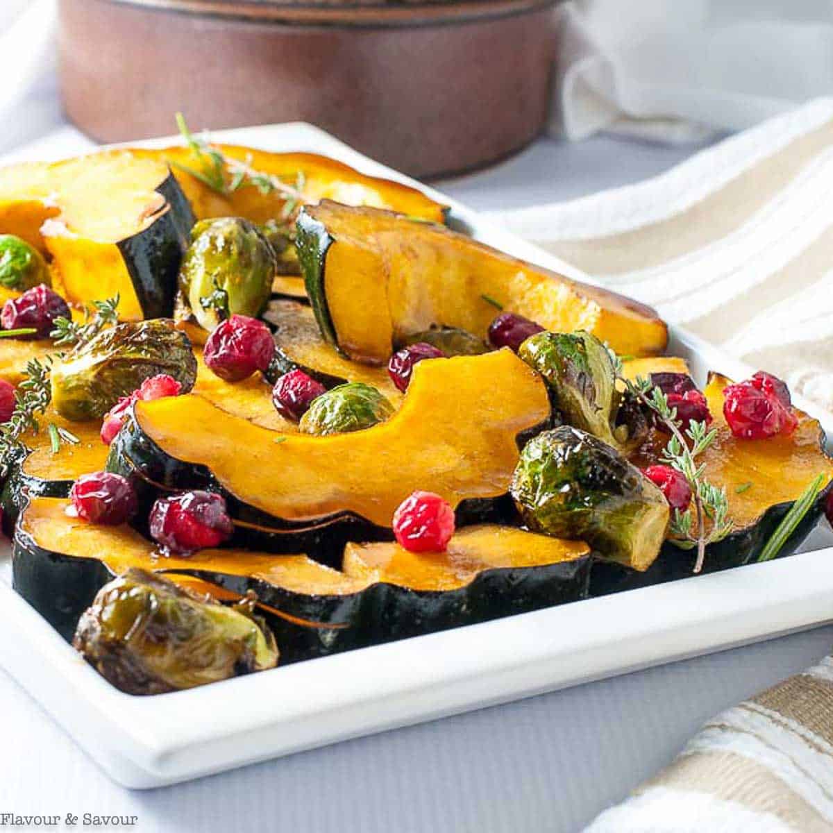 Honey Balsamic Roasted Acorn Squash on a white platter.