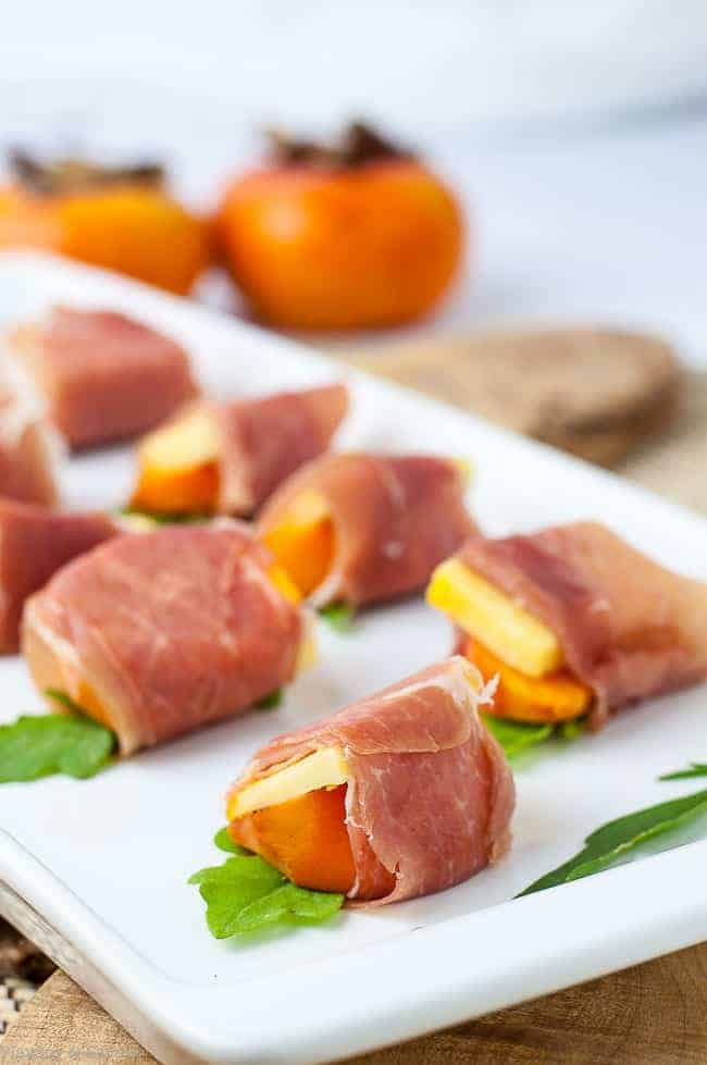 Persimmon Prosciutto Cheese Bites with arugula