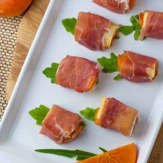 Persimmon Prosciutto Cheese Bites on serving dish