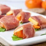 Close up view of Persimmon Prosciutto Cheese Bites