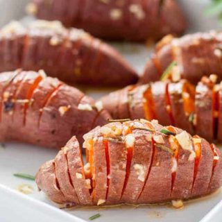 Baby Hasselback Sweet Potatoes with Garlic Herb Butter