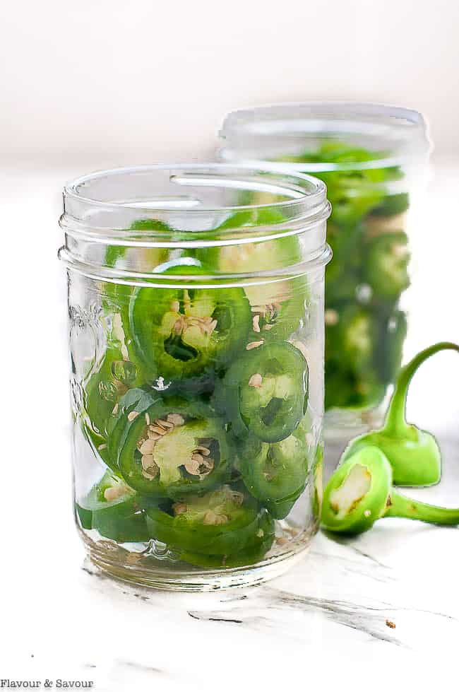 Jalapeño pepper rings in two 8 ounce Mason jars