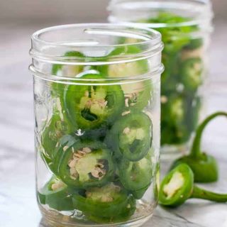 Jalapeño Pepper rings in Mason Jars ready to make Quick Refrigerator Pickled Jalapeños