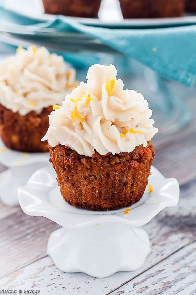 Grain-Free Carrot Cake Cupcake on a cupcake pedestal