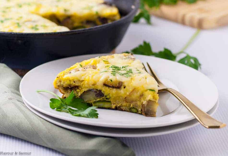 Double Cheese Asparagus Leek Frittata on a plate.