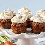 Mini Gluten-Free Carrot Cake Cupcakes with cream cheese frosting with fresh carrots