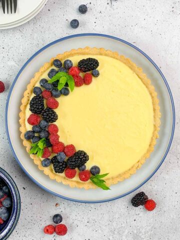 Overhead view of Lemon Curd Tart with fresh berries