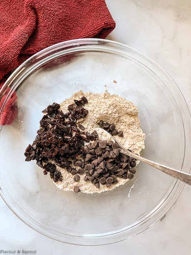 Adding cherries and chocolate to dry ingredients