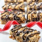 Chia Bar drizzled with chocolate and a red ribbon