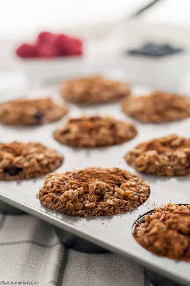 Mixed Berry Oatmeal Cups in a muffin tin.