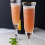 Two flutes of Rhubarb Bellini Prosecco Cocktail