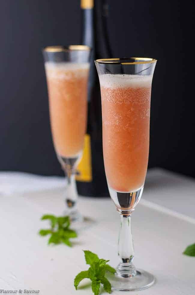 Two flutes of Rhubarb Bellini Prosecco Cocktail